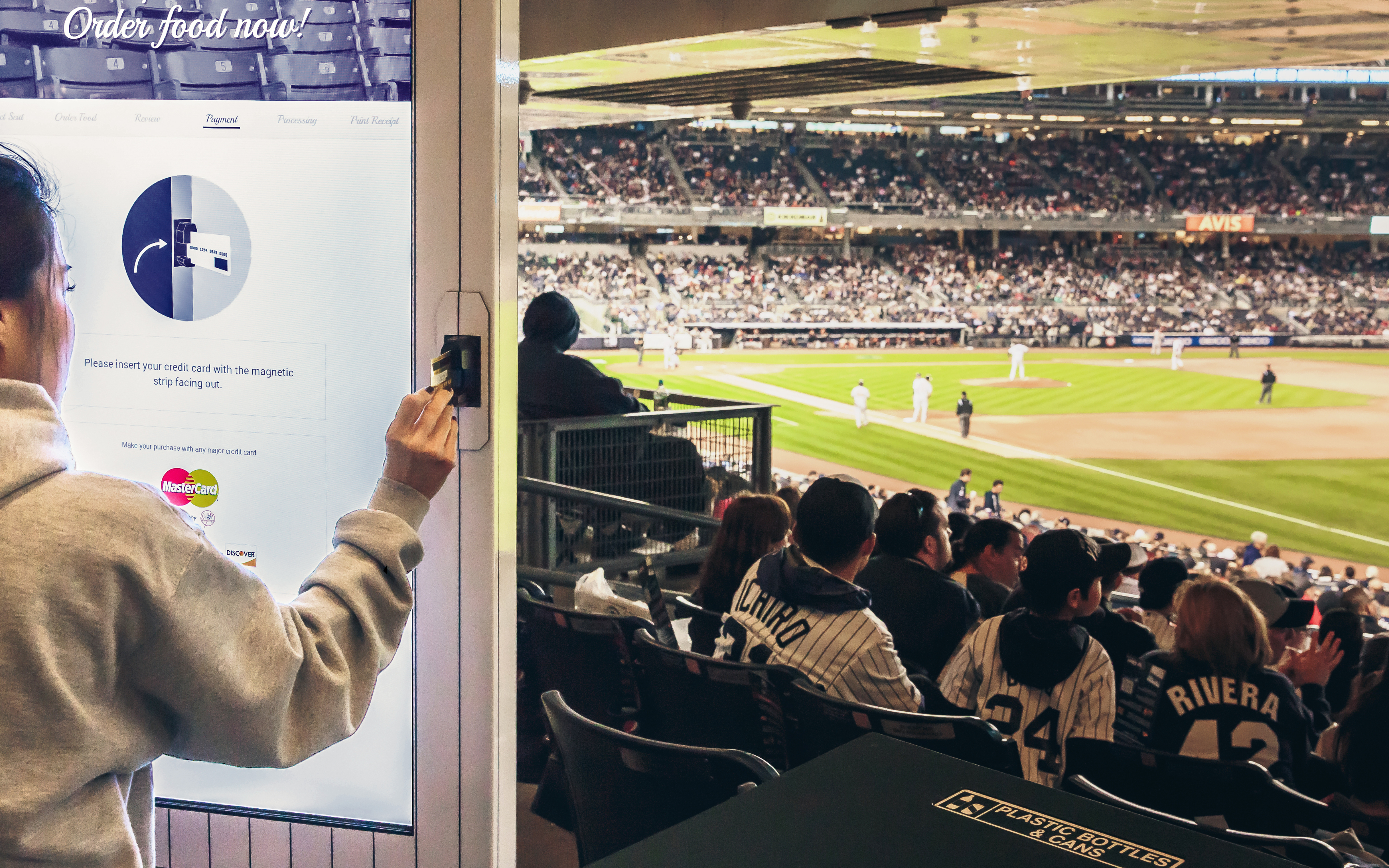 Food-ordering kiosks in the stadium concourse