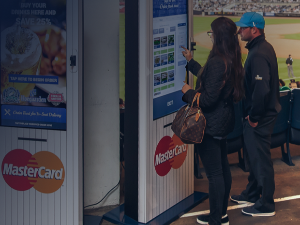 Fan using a food-ordering kiosk at Yankee Stadium